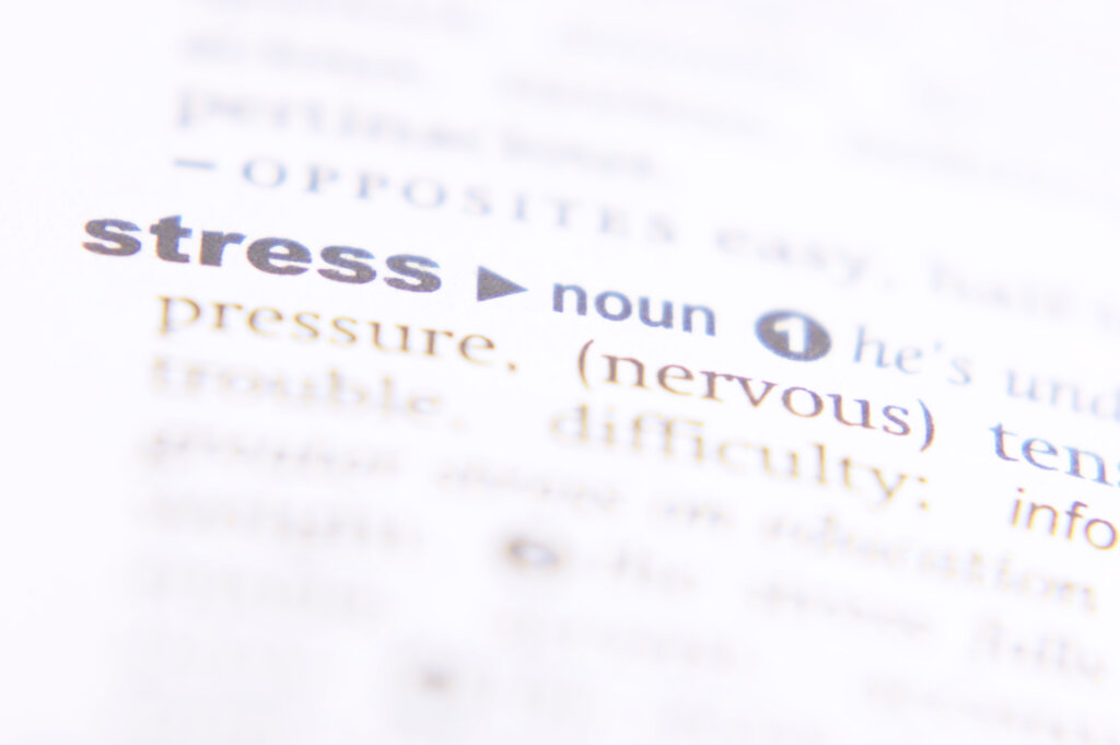 Christian Anxiety: Dictionary Definition Of Stress On White Page