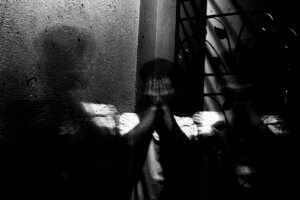 Shadow of a man with light looking like the wings of an angel